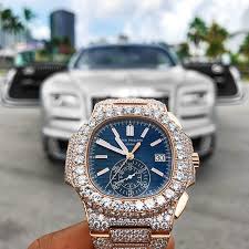 Pin Op Crm Jewelers Customized patek philippe ladies 31mm st.steel iced out. pin op crm jewelers