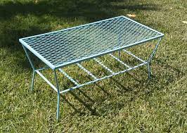 An oval coffee table is also beneficial if you have pets or children, as the lack of sharp corners means fewer bumps and bruises. Quintessential 50s Outdoor Coffee Table Garden Coffee Table Metal Patio Furniture Garden Coffee
