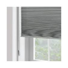 Hold the clutch by its base. Cordless Child Safe American Blind Shade