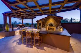 The design features a lid that is cantilevered off the back wall so there are no posts or any other obstruction when you enter the outdoor kitchen. 10 Gorgeous Backyard Kitchen Designs Diy Network Blog Made Remade Diy