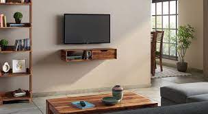 Opting for a similar looking wall mounted display is also a great way to reduce excess furniture in your bedroom and saving floor area. Sawyer Wall Mounted Tv Unit Urban Ladder