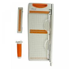 There are guillotine paper trimmers, where you put the item to be cut on a ruled board and cut it to size. 31cm Maxi Guillotine Craftyarts Co Uk