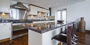 Kitchen with white cabinets and white ice granite countertops. 21 Quartz Kitchen Countertops Ideas To Inspire Kitchen