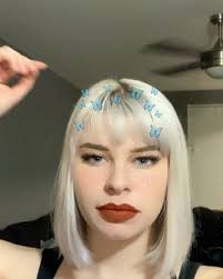 Over here cutting my bangs and being spontaneous