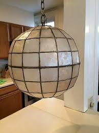 Capiz shell lighting looks elegant and a bit glamorous without being too over the top. 1960s Vintage Capiz Shell Globe Hanging Lamp 50 00 Picclick