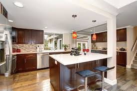 Photo by nvs remodeling & design the cozy kitchen is stuffed with dark cherry wood cabinetry, with glass front wall cabinets. 53 High End Contemporary Kitchen Designs With Natural Wood Cabinets Designing Idea