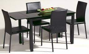 A masculine black racing stripe in a tempered glass table top will satisfy both your designer side and masculine side. Black Glass Top Modern Dining Table W Optional Chairs