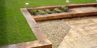 Gravel boards are a quick and easy way to create informal raised beds of almost any shape. Brick Natural Stone Or Timber Edging Lawn Edgings