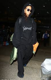 At next, there's even a £30 pair of ripped maternity. Rihanna Hides Away Under Oversized Gothic Hoodie And Baggy Trousers For Low Key Arrival In Los Angeles After Paris Love In With Travis Scott Daily Mail Online