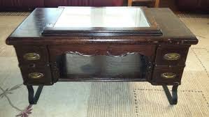 Coffee Table Made From An Antique Sewing Machine Cabinet Sewing Machine Cabinet Sewing Machine Table Redo Antique Sewing Machines