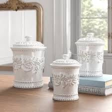 4 piece ceramic canister set with wooden spoons, white. 15 Stylish Kitchen Canisters To Liven Up Your Space