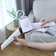 Portable electric clothes dryer is designed to quickly dry clothes, shoes, hats, feathers, and maintain the original shape and vivid color of the clothes without any wrinkles. Portable Electric Clothes Drying Hanger Home Goods Clothing Accessories Online Awessories