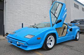 Paris's supercars to see all supercars. Baby Blue Lamborghini Countach 5000 Qv With Quicksilver Exhaust Gtspirit