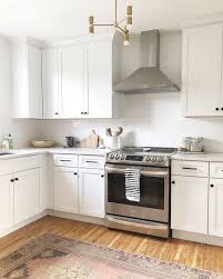 White cabinets with black hardware. White Kitchen Cupboards Black Handles Instaimage