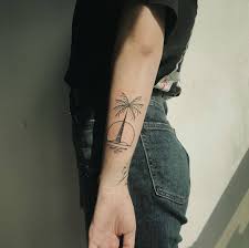 It is a bright and colourful arm palm tree tattoo. 23 Harmonious Palm Tree Tattoos And Symbolism Behind Them