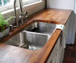 Wood countertops cozy up a traditional or country kitchen. Charming And Classy Wooden Kitchen Countertops