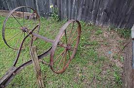 The first documented artifacts that we have showing humanity using the wheel come from around 4000bc when the sumerians were beginning to live in cities. Antique Metal Rustic Wagon Wheels With Sprocket Axle Garden Yard Western Art Ebay