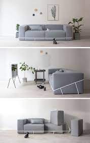 A Simple Metal Frame Contains The Six Cushions That Make Up This Sofa Sofa Frame Sofa Design Minimalist Sofa