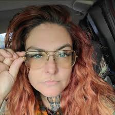 Looking for a female artist near metro Detroit to do a traditional peony  tattoo?