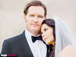 A marital dress, typically all white and decorated with frills and veils. Jerrod Niemann Married Wedding Photos People Com