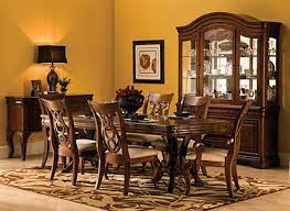 Raymour Flanigan Vintage Dining Collection In Warm And Golden Tones Raymourandflanigan Classic Dining Room Antique Dining Tables Dining Room Furniture