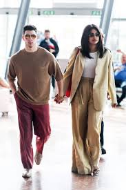 A musician and former member of the jonas brothers. Priyanka Chopra And Nick Jonas Upgrade The Look Of Twinning Airport Style Vogue