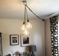 68 Apartment Decorating Ideas And Organization Tips For Renters Plug In Pendant Light Hanging Pendant Lamp Swag Pendant Light