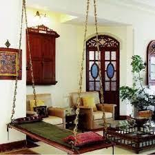 Decorated usually with wood sofas and cushions, this place is where the family sit together to enjoy. South Indian Traditional House Design Plan And Images