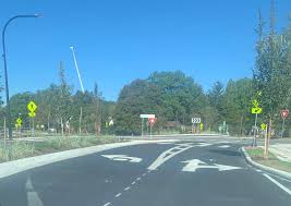 ELLET ROUNDABOUT* Let's talk about "the dot". We've already got cars  turning the wrong way because they are confused by the signage. The left  arrow with "the dot" does not mean turn