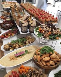 A buffet is a system of serving meals in which food is placed in a public area where the diners serve themselves. The Translator Catering Ideas Food Party Food Buffet Party Food Appetizers