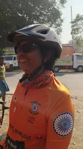 Every village has a tractor with loud music!!, This village has a woman