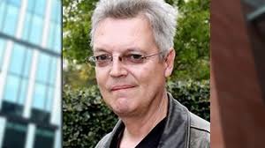 Shamed Bury councillor Simon Carter spared jail for making indecent images  of children