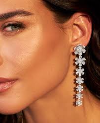 Florals? For spring? Cute.​ Florals in diamonds? Groundbreaking 🌼​  ​Diamond Daisy earrings, now in store.​ ​Secure your exclusive styling 📲