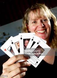 Kathy Eder holds a deck of "Operation Hidden Agenda" playing cards... News  Photo