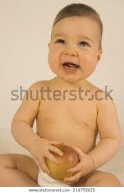Baby Holding Apple Stock Photo Edit Now 216792625