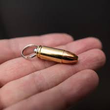 (firearms) cartridge, round (live ammunition for a gun). Schlusselanhanger 9mm Patrone Mit Hexagon Geschoss