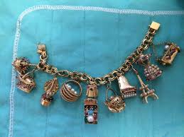 14k yellow gold double strand heart 9 inch 1 adjustable chain plus size extender anklet ankle beach bracelet fine jewelry for women mothers day gifts gifts for her. Articulated 14k Gold Charm Bracelet With Precious Stones Collectors Weekly