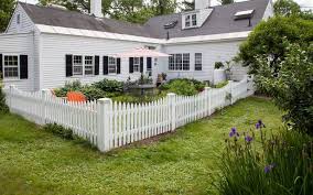 This do it yourself picket fence is made up of tree branches which are cut evenly and left to weather naturally. Beyond The White Picket Fence Designs And Styles To Consider