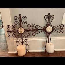 Traditional tabletop holders are available with intricate design patterns able large living spaces will enjoy the ambiance of a floor candelabrum while bare walls can be enhanced with beautiful sconces. Wall Decor Soldpr Wrought Iron Cross Wall Candle Holders Poshmark