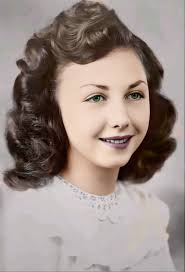 Can someone edit my grandma's photo to have dark brown hair and green eyes?