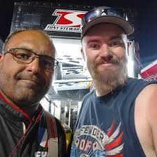 Throwback photo of young men in motorsports