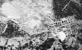 File:Tachikawa Aircraft Company, Japan, under attack by U.S. Navy ...