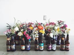 60 Craft Beer Bottle Centerpieces Arranged Into Groups Of 3 And Ready For Boxing Up For Delive Bottle Centerpieces Beer Bottle Centerpieces Beer Themed Wedding