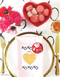 French decor, menu, and a fun game to transport you and your friends to paris for a valentine's day dinner to remember. A Modern Valentine S Day Dinner Party Party Ideas Party Printables Blog