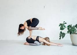 6 Partner Yoga Moves Anyone Can Do Om The City Partner Yoga Poses Partner Yoga Yoga Moves