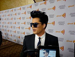 Lambert established that he is here to put on a show, one the music video is one that takes place in an underground nightclub catering to fetish, lead by ringleader of entertainment: Adam Lambert Wikipedia
