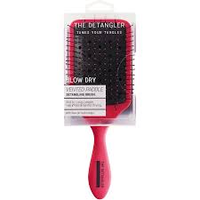The most common big hair brush material is wood. The Detangler Vented Paddle Styling Hair Brush Pink Big W