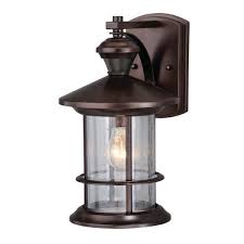 Shop Everett Bronze Motion Sensor Dusk To Dawn Outdoor Wall Light Overstock 27871546 8 In W X 13 5 In H X 9 5 In D Metallic Bronze