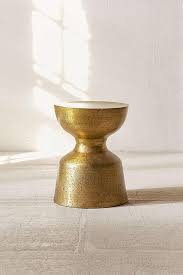 Zhonya's hourglass resulted from the separation of the offensive and defensive abilities of the removed item zhonya's ring. Elle Antiqued Rounded Side Table