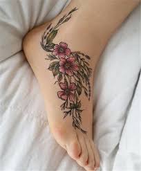 The most popular foot tattoo designs are usually small in nature, such as flowers (especially cherry blossom and lotus flowers), words (and quotes), stars and butterflies. Stunning Foot Tattoo Designs To Conquer Your Heart Cute Hostess For Modern Women Foot Tattoos Foot Tattoo Floral Foot Tattoo